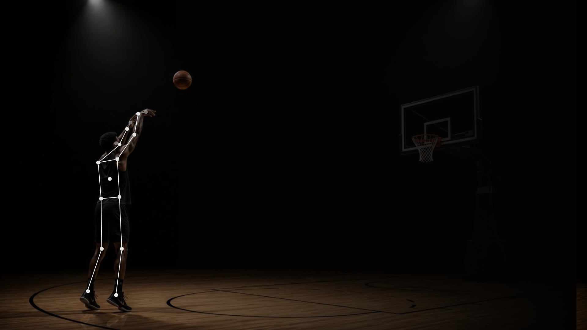 Basketball shooter analyzed in a dark court.